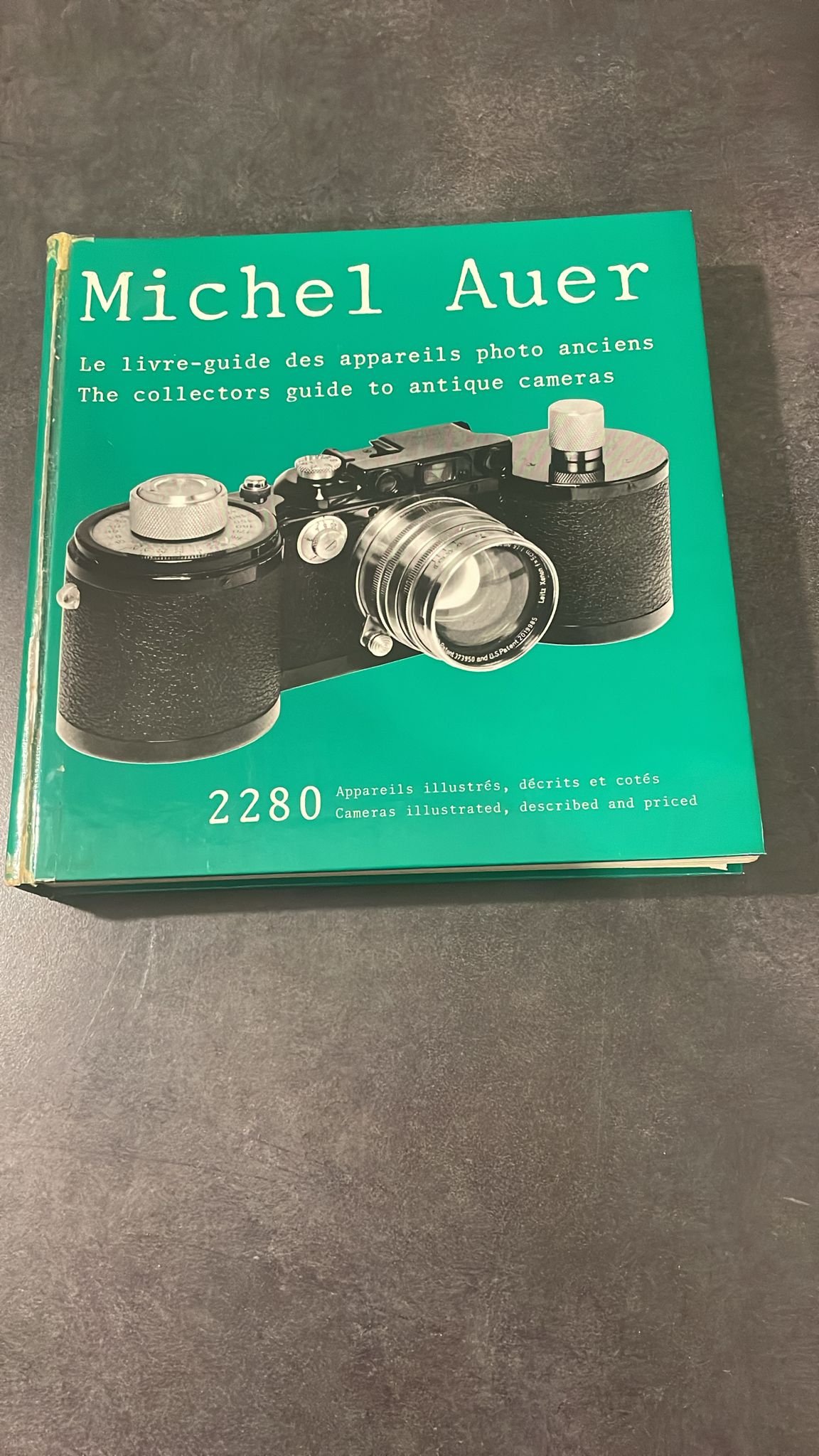 Michel Auer aura vécu pour la photographie ancienne et moderne. Guide des appareils photos ancien .